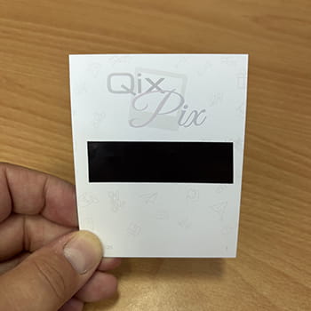 Back of a retro photo with a magnet